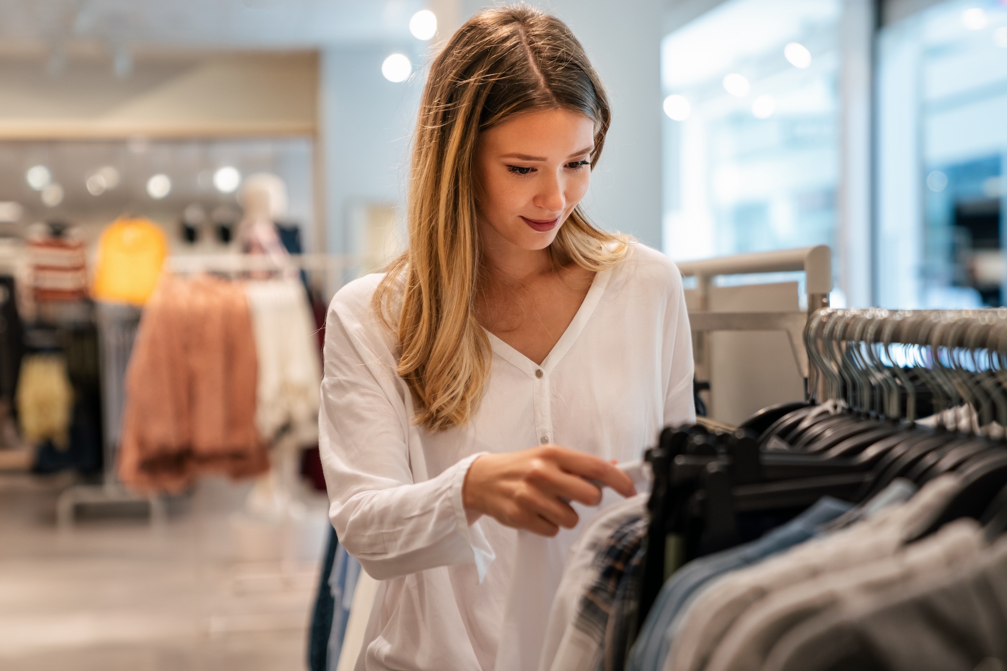 Woman shopping at a clothing boutique
